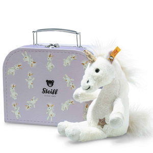Unica dangling unicorn in suitcase